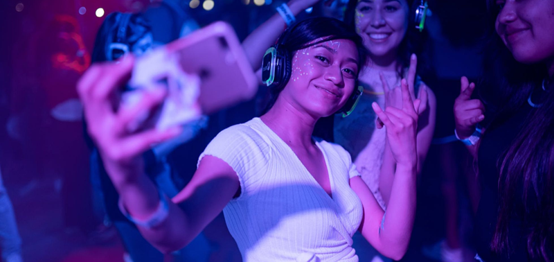 DJ at a silent disco using NoSongRequests.com to organize multi-channel requests